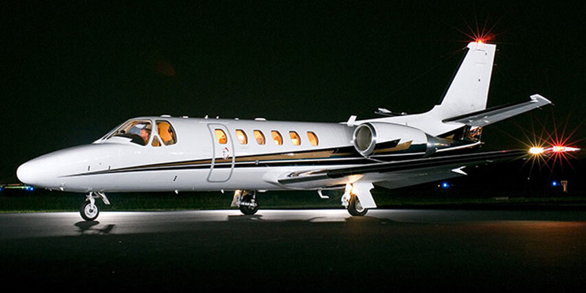 Citation Bravo Light Jet on Private Airport runway at night